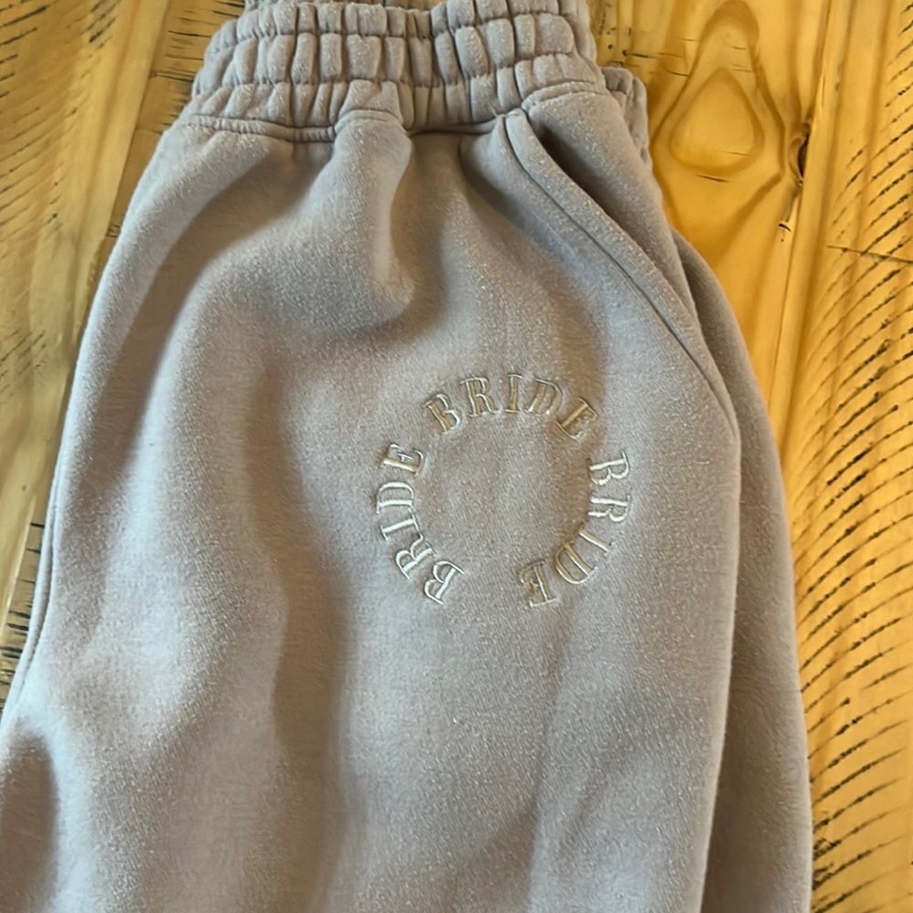 Six Stories Embroidered BRIDE joggers in taupe. Size L